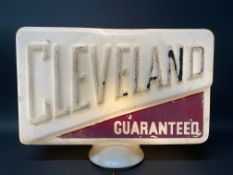 A Cleveland Guaranteed rectangular glass petrol pump globe with raised lettering, faded and minor