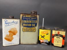A Vic Mores Ltd Guaranteed Motor Oil quart can, a Rapideze pint can and two smaller oil cans.
