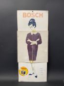 A Bosch French battery shop display advertising display calendar in the form of a pin-up girl with