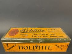 A Holdtite puncture repair outfit tin with original contents.