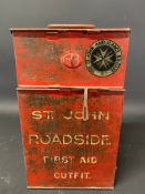 A wall mounted St. John Ambulance Brigade 'Roadside First Aid Outfit'.