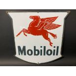A Mobiloil enamel sign with flying pegasus motif, 15 x 15".