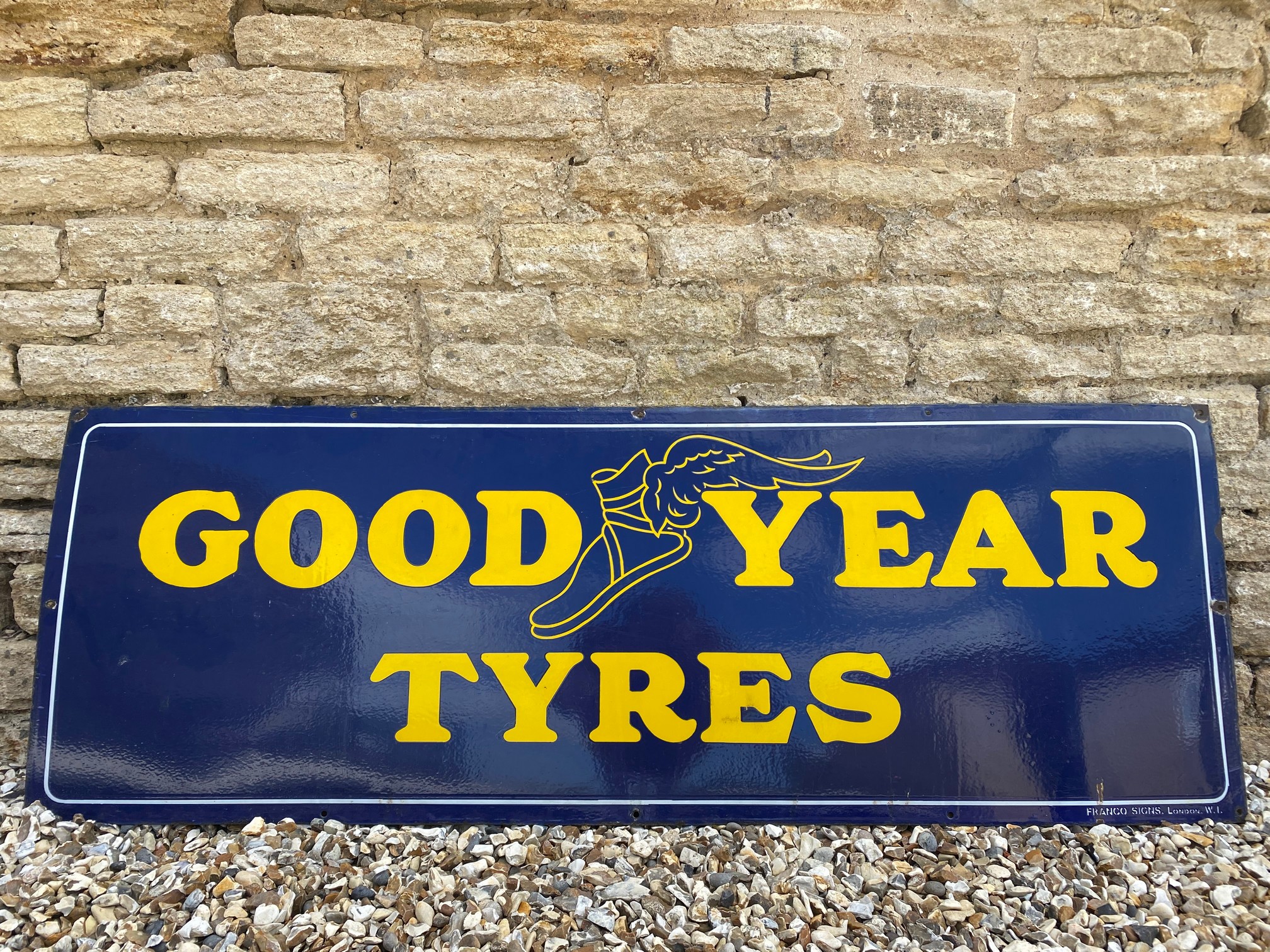 A Goodyear Tyres rectangular enamel sign by Franco, in superb condition, 60 x 21".