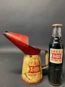 A Shell X-100 Motor Oil pint bottle plus a Shell quart measure.