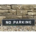 A cast iron No Parking sign, 35 1/2 x 7 1/2".