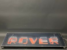 A Rover neon garage showroom illuminated sign by Brillite, 35 3/4" w x 11 3/4" h x 2 1/4" h.