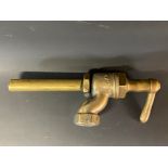 A Bowser bronze petrol pump nozzle/trigger, dated 1910.