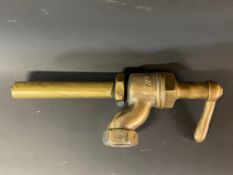 A Bowser bronze petrol pump nozzle/trigger, dated 1910.