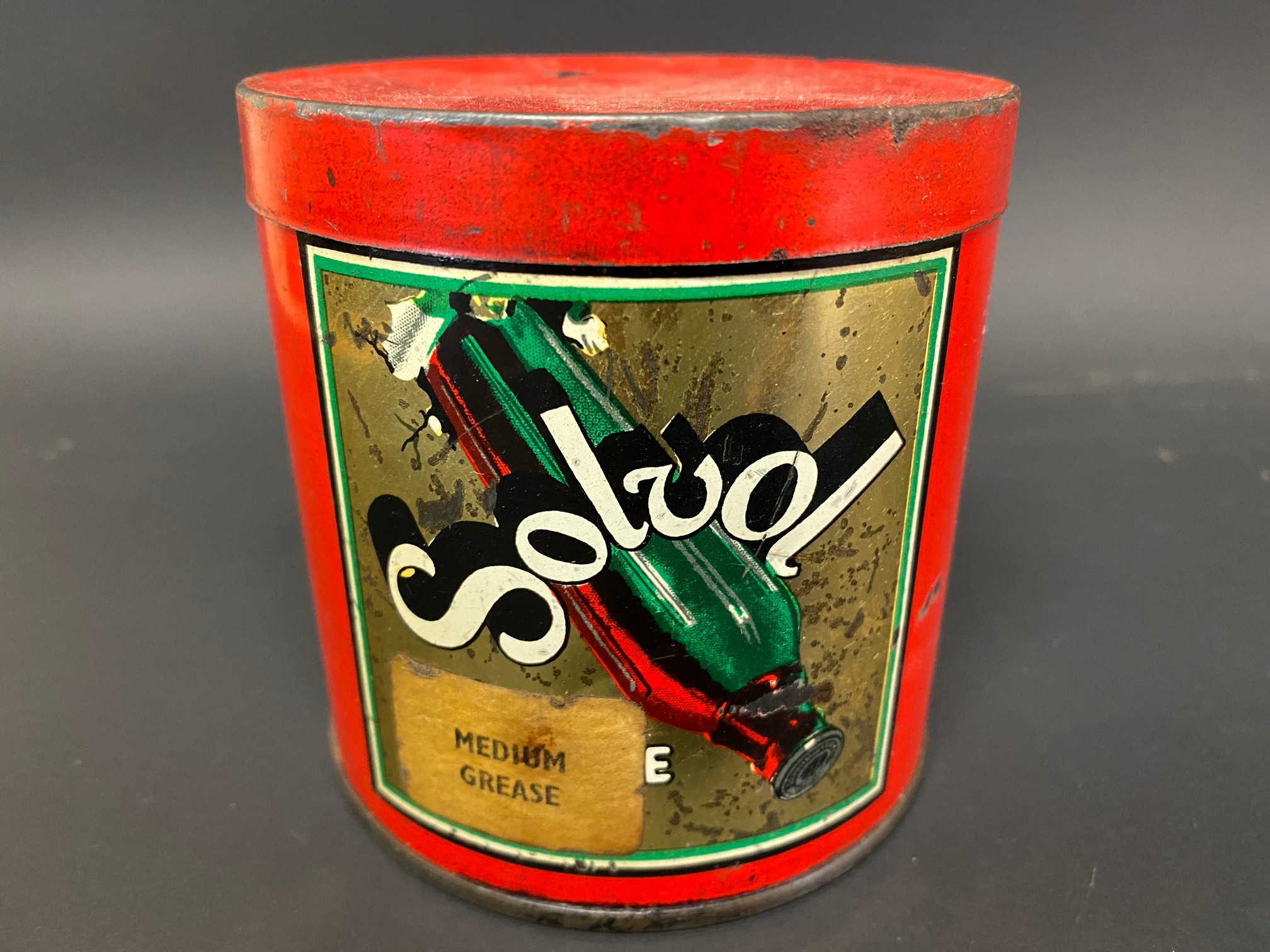 A Solvol grease tin in good condition.