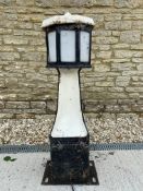 A small early octagonal road bollard, 39" h.