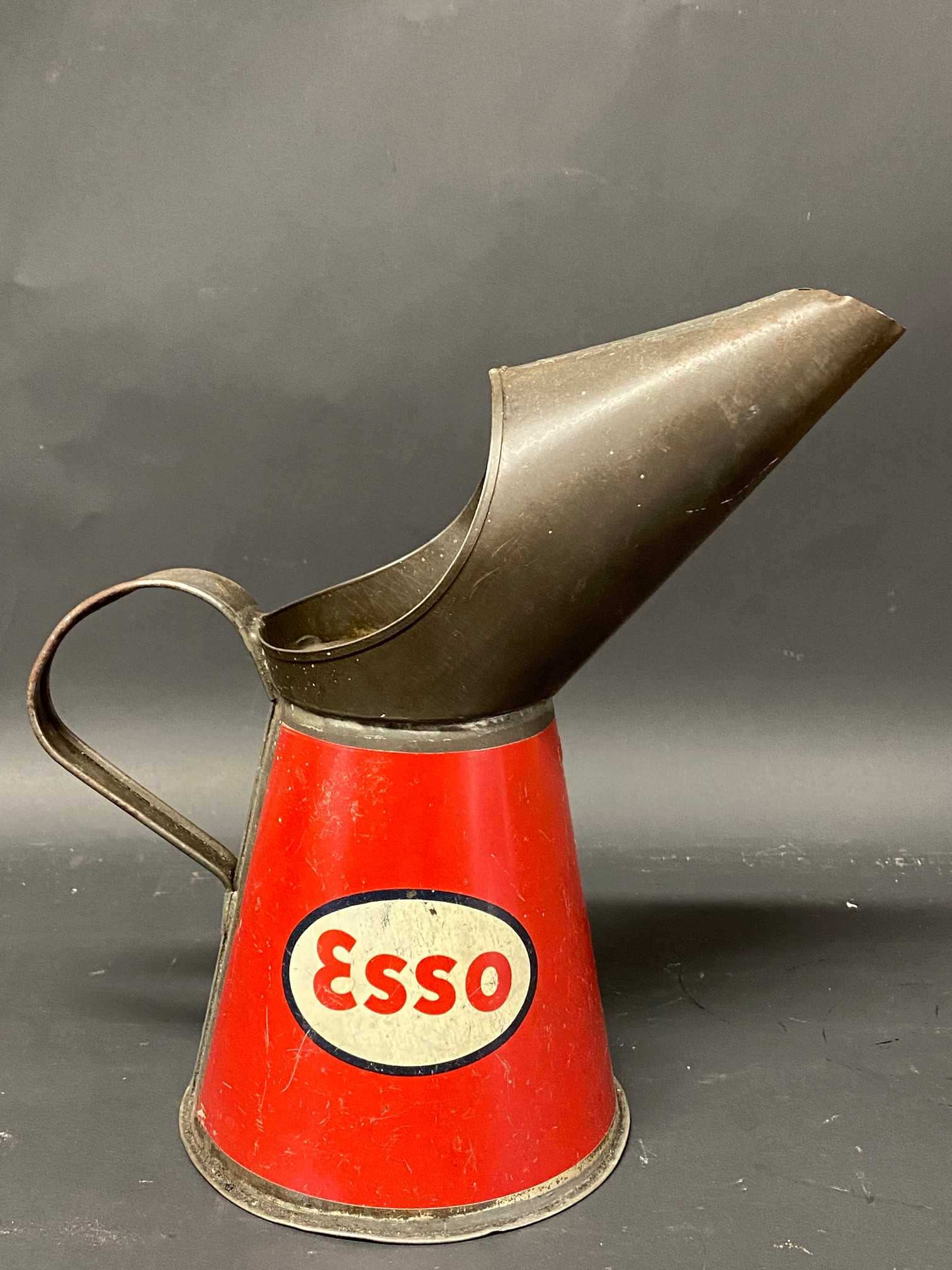 An Esso quart measure in good condition, dated 1951.