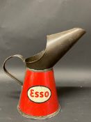 An Esso quart measure in good condition, dated 1951.