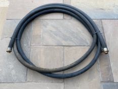 Two 3/4" rubber petrol pump hoses with fittings attached.