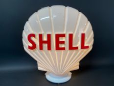 A contemporary Shell plastic petrol pump globe.