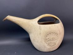 A Shell watering can, for a garage forecourt.