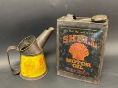 An early Shell Motor Oil half gallon can and a Shell pint measure.