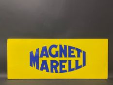 A contemporary Magneti Marelli enamel sign in good condition, 36 x 14 1/2".