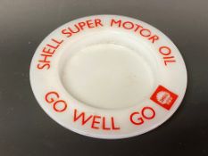 A Shell Super Motor Oil milk glass trinket dish.