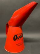An Ovoline Motor Oil quart measure in excellent condition, dated 1956.