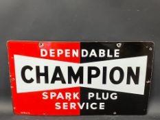 A Champion Dependable Spark Plug Service enamel sign in excellent condition, dated 1951, 23 x 13".