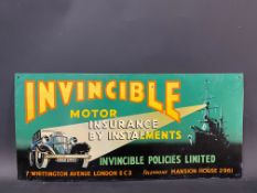 An Invincible Motor Insurance pictorial tin advertising sign with a scene of a ship's searchlight