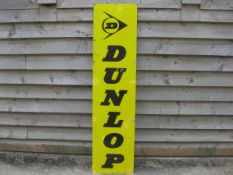 A Dunlop enamel sign, with a few spots retouched, 18 x 72".