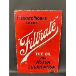 A Filtrate oils rectangular enamel sign, 14 1/4 x 21 1/4.