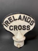 A cast iron village marker for Irelands Cross, in Woore, Shropshire, 13 1/2" h.