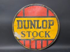 A Dunlop Stock circular double sided enamel sign, 24" diameter.