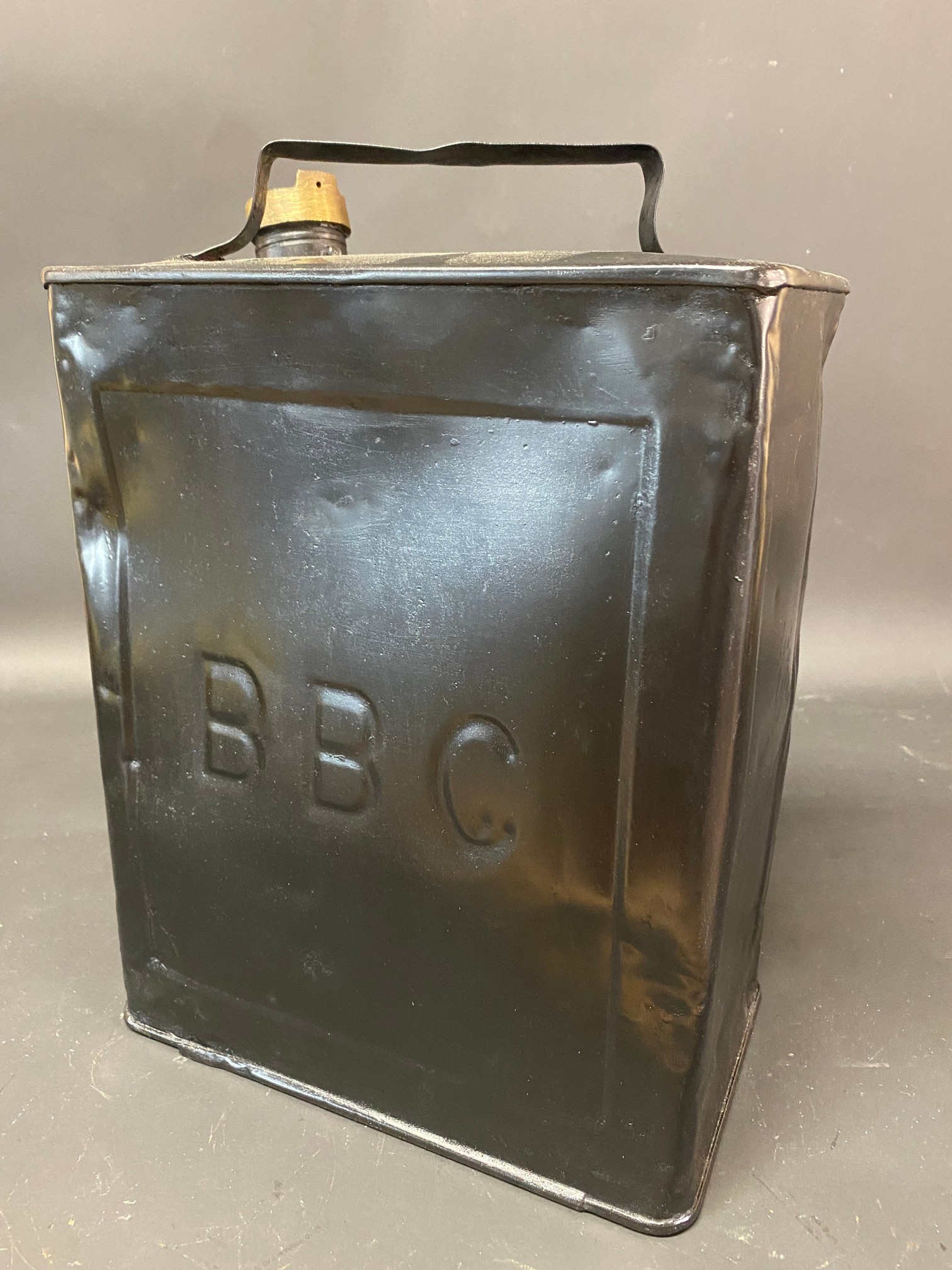 A BBC two gallon petrol can with coronet motif to the top.