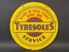A Tyresoles Service circular double sided advertising sign, 18" diameter.