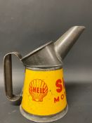 A Shell Motor Oil pint measure in excellent bright condition.