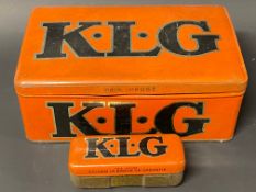 A large KLG spark plugs tin and a smaller tin for a single plug.