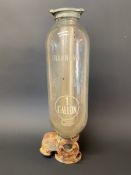 A Hammond gallon glass petrol pump cylinder.