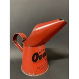 An Ovoline Motor Oil pint measure in excellent condition.