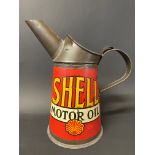 A Shell Motor Oil quart measure in exceptional condition, dated 1930.