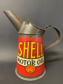 A Shell Motor Oil quart measure in exceptional condition, dated 1930.