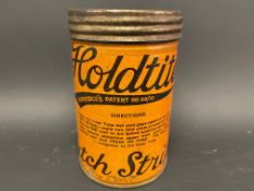 A Holdtite Patch Strip cylindrical tin in good condition, still with contents.