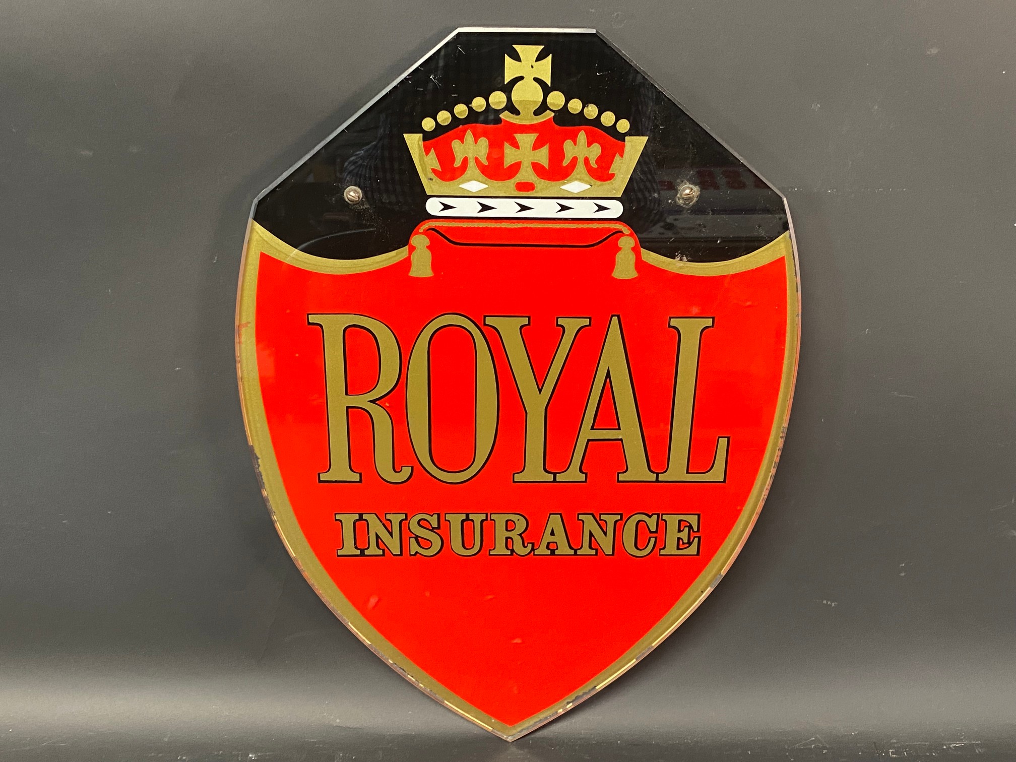 A Royal Insurance shield shaped glass advertising sign, 12 x 17".