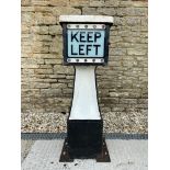 An early Keep Left bollard with three glass panels, 48" h.