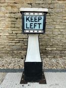 An early Keep Left bollard with three glass panels, 48" h.