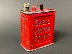 A miniature perfume tin in the shape of a Shell Motor Spirit two gallon petrol can.