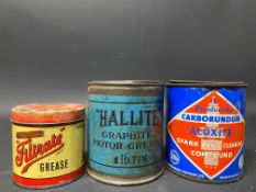 A Hallite Graphite Motor Grease 1lb tin, a tin of Carborundum Spark Plug Cleaning Compound and a