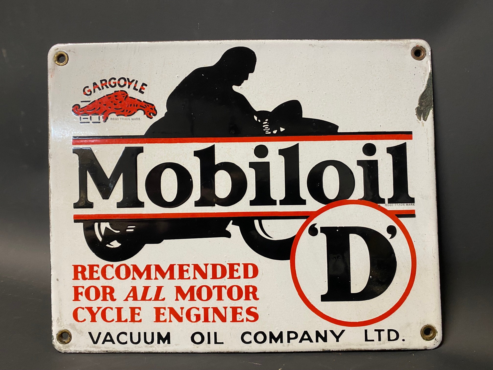 A Gargoyle Mobiloil 'D' grade enamel sign with image of a motorcycle and rider, excellent condition,