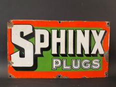 A Sphinx Plugs enamel sign, 16 x 9".