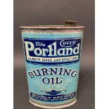 A Portland Curry Burning Oil oval can in good condition.