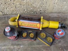 A Carburol UCL gun, a Bowes Seal Fast can, and various grinding paste tins.