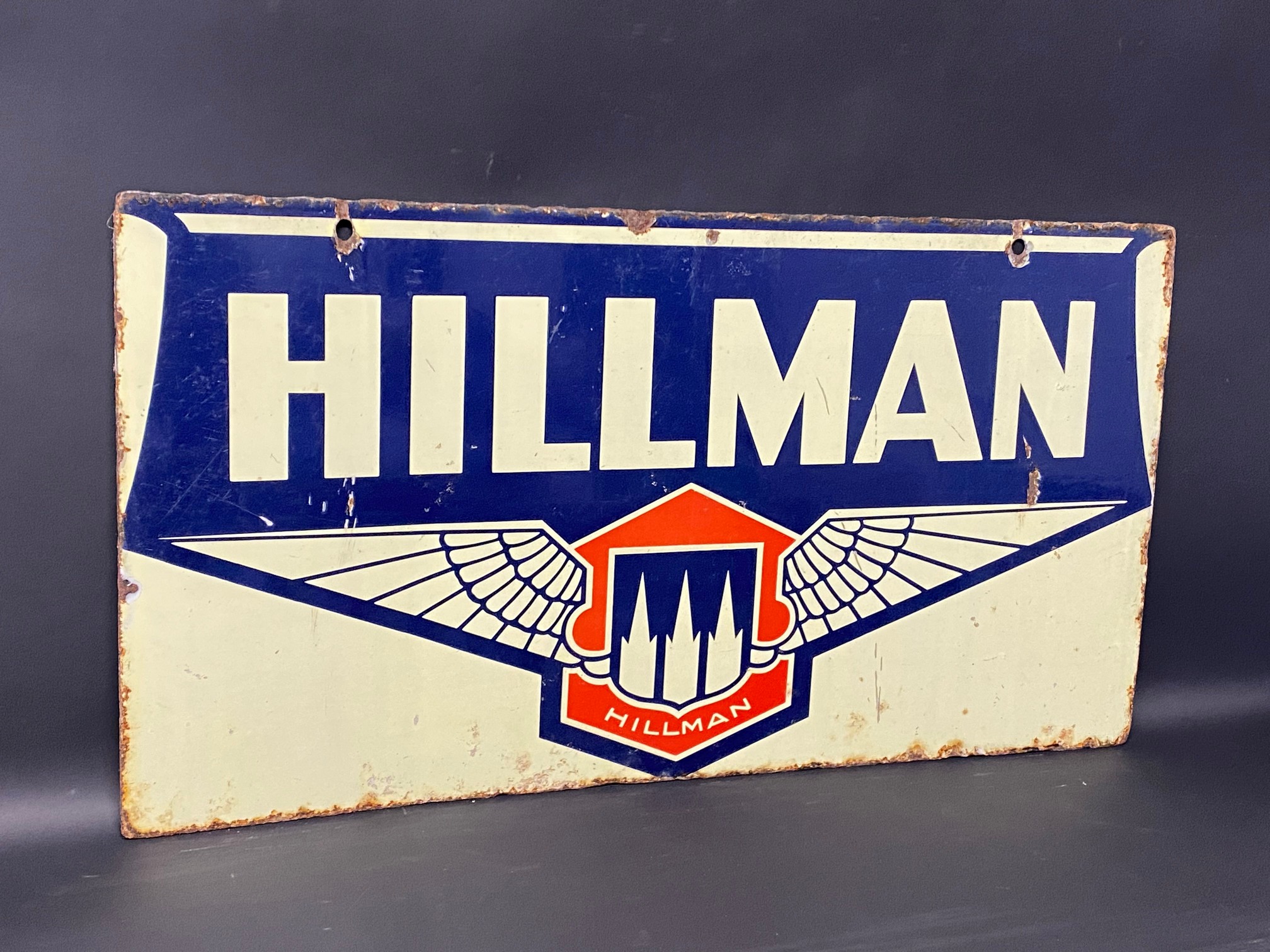 A Hillman rectangular double sided enamel sign by Franco, 28 x 15".