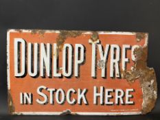 An early Dunlop Tyres in Stock Here double sided enamel sign with partial hanging flange, by