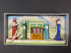 A boxed Dinky Toys No.49 set of die-cast petrol pumps.